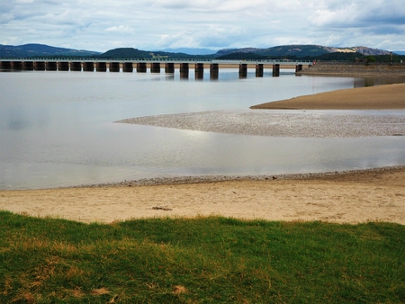 Viaduct over the Kent River estuary at high tide near Arnside, Cumbriaの写真素材