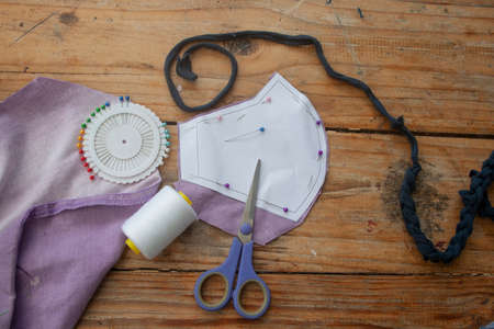 Making material face masks at home from a pattern.の写真素材