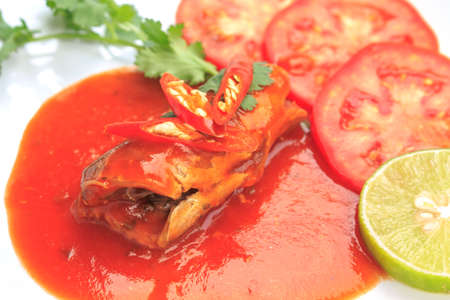 fish mackerel sauce on white backgroundの写真素材