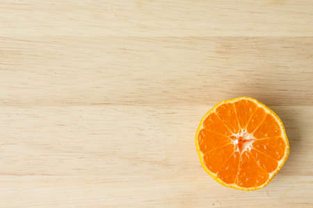 orange fruit peel on wooden backgroundの写真素材