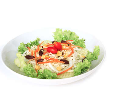 green salad plate fresh vegetable border on white backgroundの写真素材