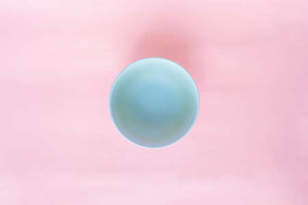 bowl blue on pink background rose quartzの写真素材