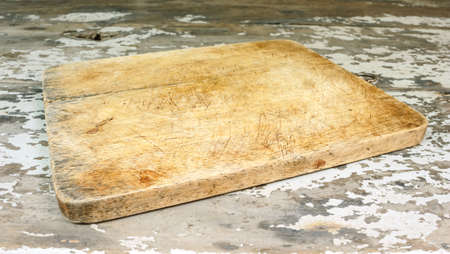 cutting board wooden on old tableの写真素材