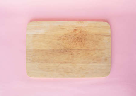 cutting board wood on pink background rose quartzの写真素材
