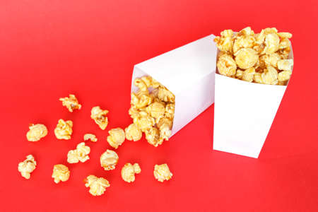 popcorn white box on red backgroundの写真素材