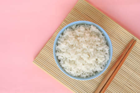 rice in bowl on pink background rose quartz