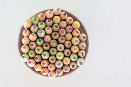 colored pencils drawing multicolored on white backgroundの写真素材