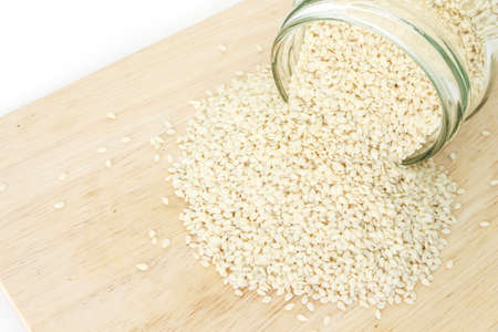 white sesame seed on wood backgroundの写真素材