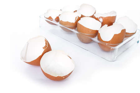 egg shell broken crack food on white backgroundの写真素材