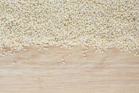 white sesame seed on wood backgroundの写真素材