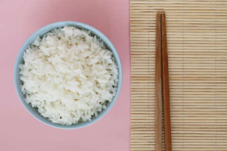 rice in bowl on pink background rose quartzの写真素材