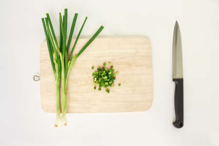 green onion vegetable cutting board nature food on cutting board backgroundの写真素材