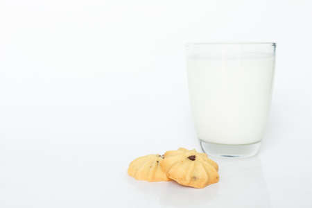 cookies and milk on white backgroundの写真素材
