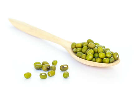 mung bean green in spoon texture on white backgroundの写真素材