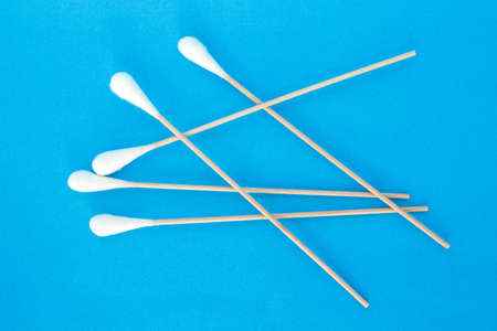 cotton bud, swab clean healthcare top view on blue background