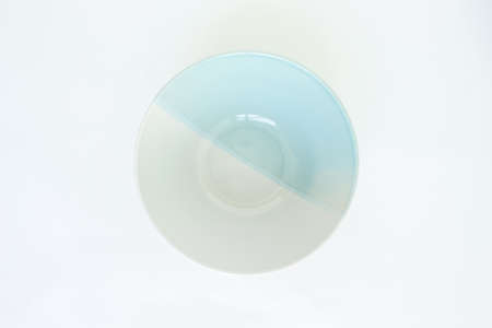 white blue bowl pattern top view on white backgroundの写真素材