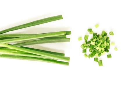green onion cutted chives pile nature food on white backgroundの写真素材