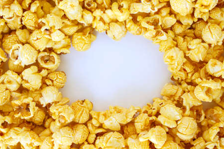 popcorn pile, frame, border on white backgroundの写真素材