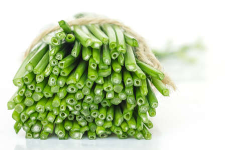 chinese chive flowerring onions stalk vegetable food nature backgroundの写真素材