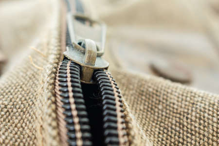 zipper clothing brown jacket macro pattern backgroundの写真素材