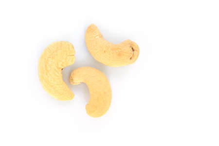 heap cashews top view on white background.