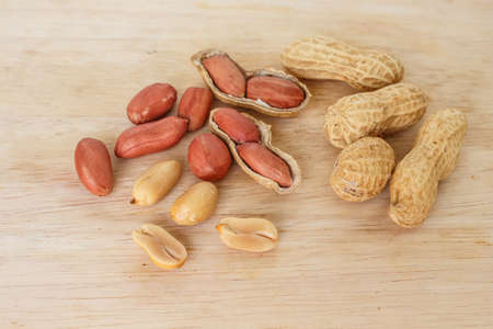 peanut in shell on wood background