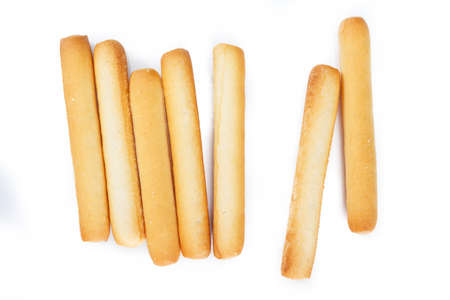 bread sticks top view on white background.の写真素材