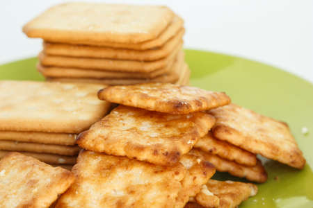 craker on plate on white background.の写真素材