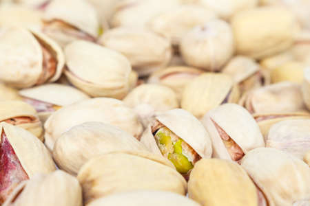 heap pistachios full texture background.の写真素材