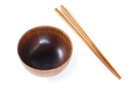 bowl and chopsticks wooden on white background.の写真素材