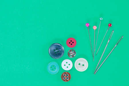 accessory embroidery sewing on green background.