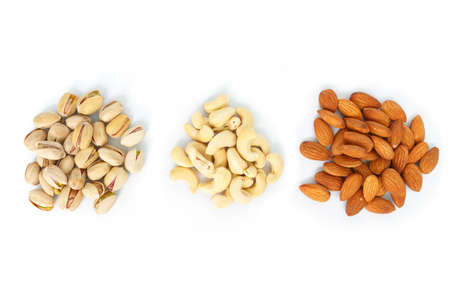 mix almond and pistachio and cashew on white background