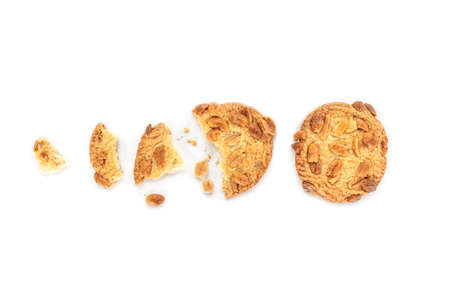 peanut cookie broken on white background.