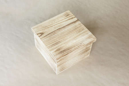 wooden box empty on brown background.