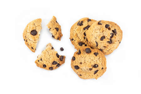 Broken chocolate cookie on white background.