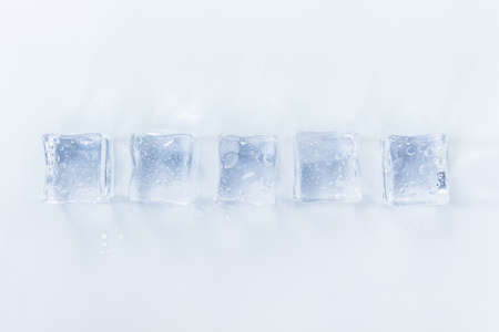 group ice cubes on white background.