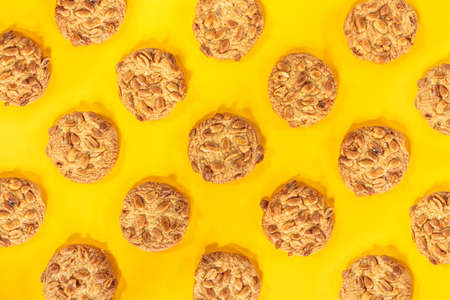 peanut cookie on yellow background.