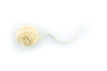 yarn color white on white background.の写真素材