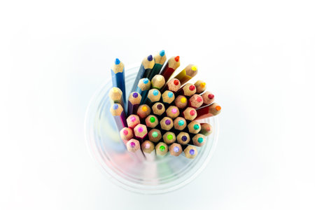 pencils in cup or mug on white background.