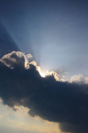 Sunshine over cloudsの写真素材