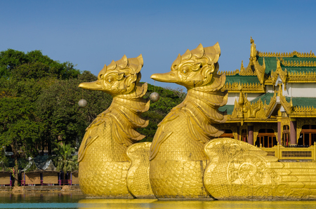 Close-up of couple of Karaweik bird, prow of floating Karaweik palace (replica), Yangon, Myanmarのeditorial素材
