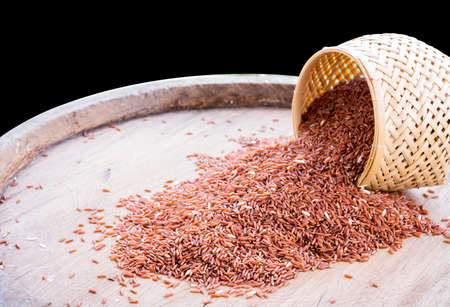 rice berry in wicker containerの写真素材