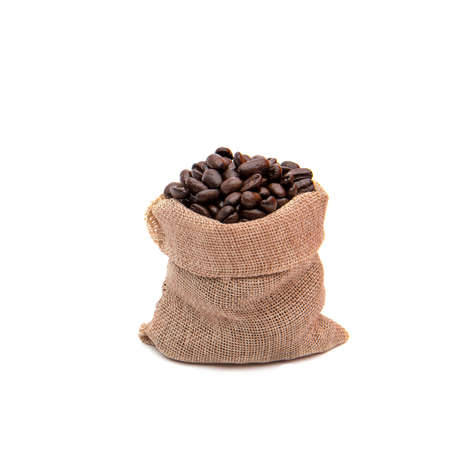 isolated coffee beans in burlapの写真素材