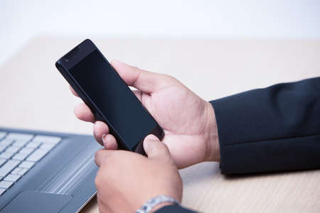 young business man using smart phone, business concept