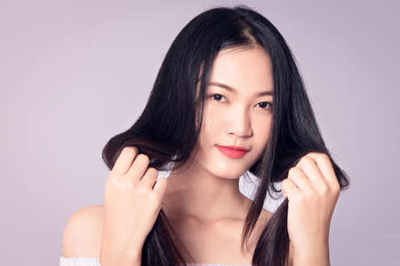 beautiful Thai model isolated on white backgroundの写真素材