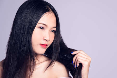 beautiful Thai model isolated on white backgroundの写真素材