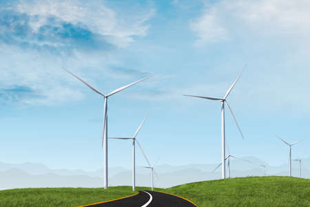 wind turbine with blue sky with road inside farmの写真素材