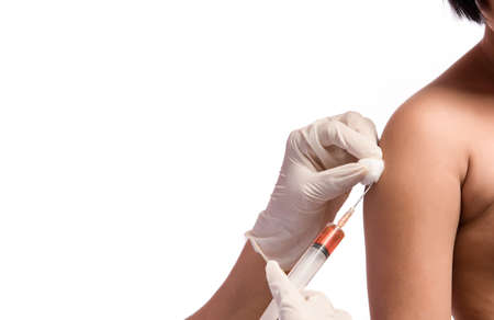 doctor or nurse vaccinating to kidの写真素材