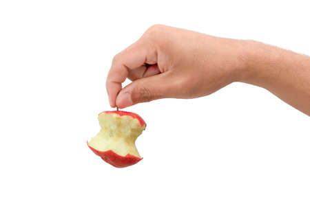 hand holding bite red appleの写真素材