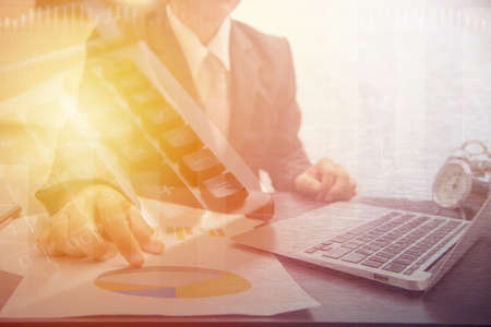 double exposure,illustration,background,black,black background,business,button,calculate,calculator,character,close,compute,computer,copy space,design,device,digital,display,education,electronic,equipment,finance,financial,gray,icon,keyboard,light,math,mathematical,mathematics,money,multiply,nobody,number,object,office,plastic,press,price,school,season,sign,single,studio,subtraction,symbol,table,technology,white,workの写真素材